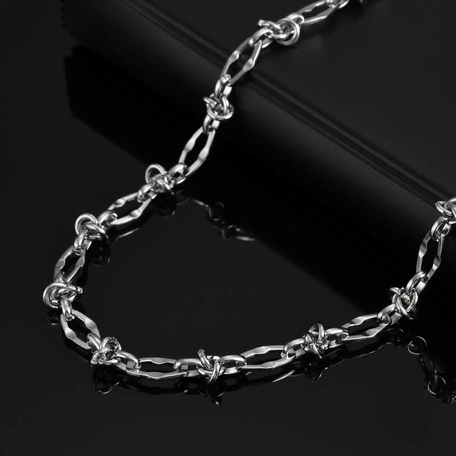 Thorn Knot Necklace - Silver - BRAVAN Thorn Knot Necklace - Silver  (Store description)