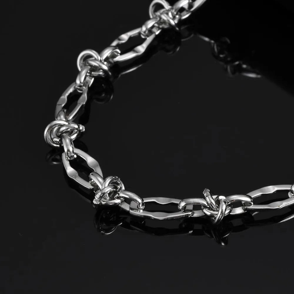 Thorn Knot Necklace - Silver - BRAVAN Thorn Knot Necklace - Silver  (Store description)